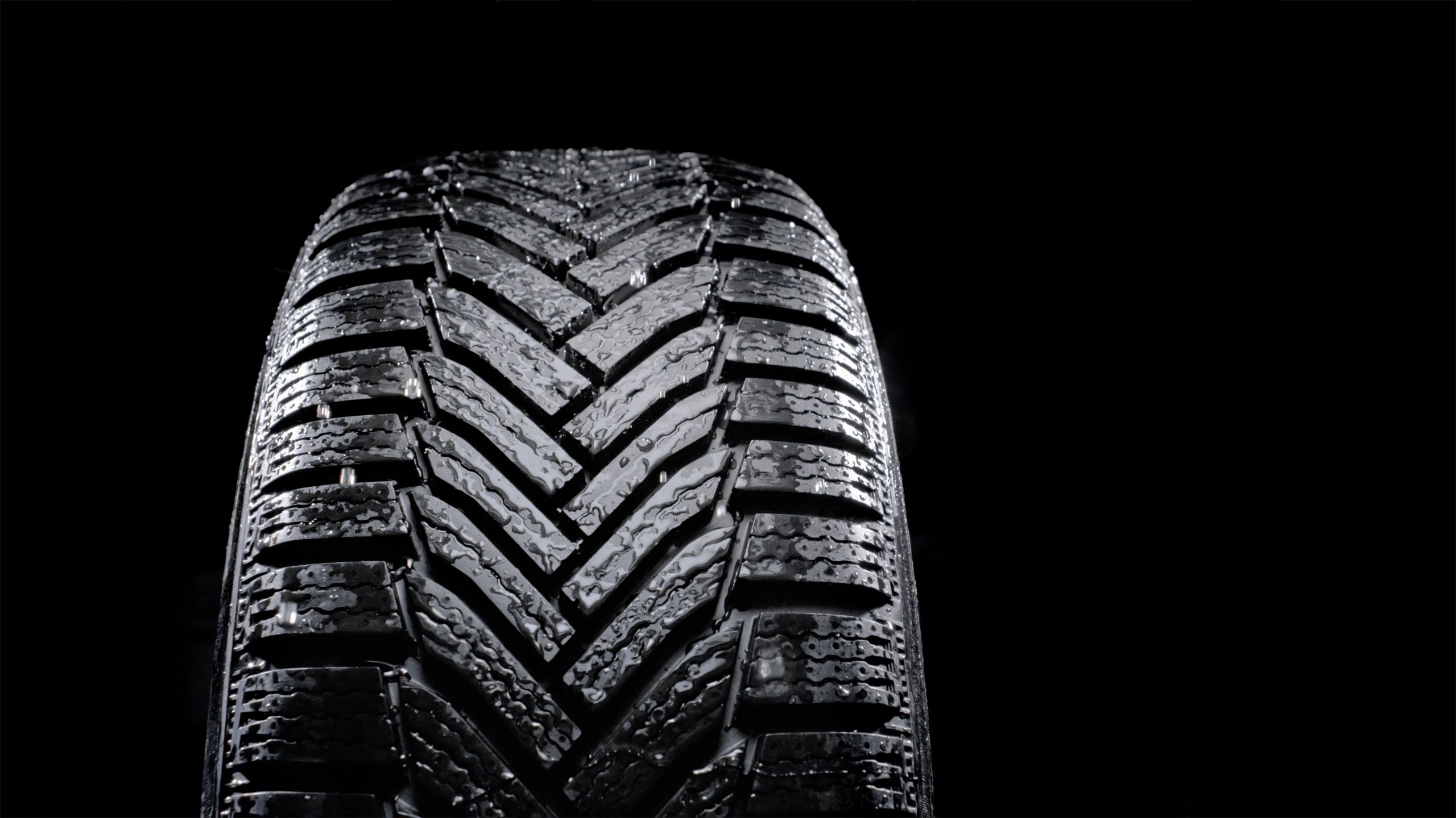 Close-up of a car tire on a vehicle