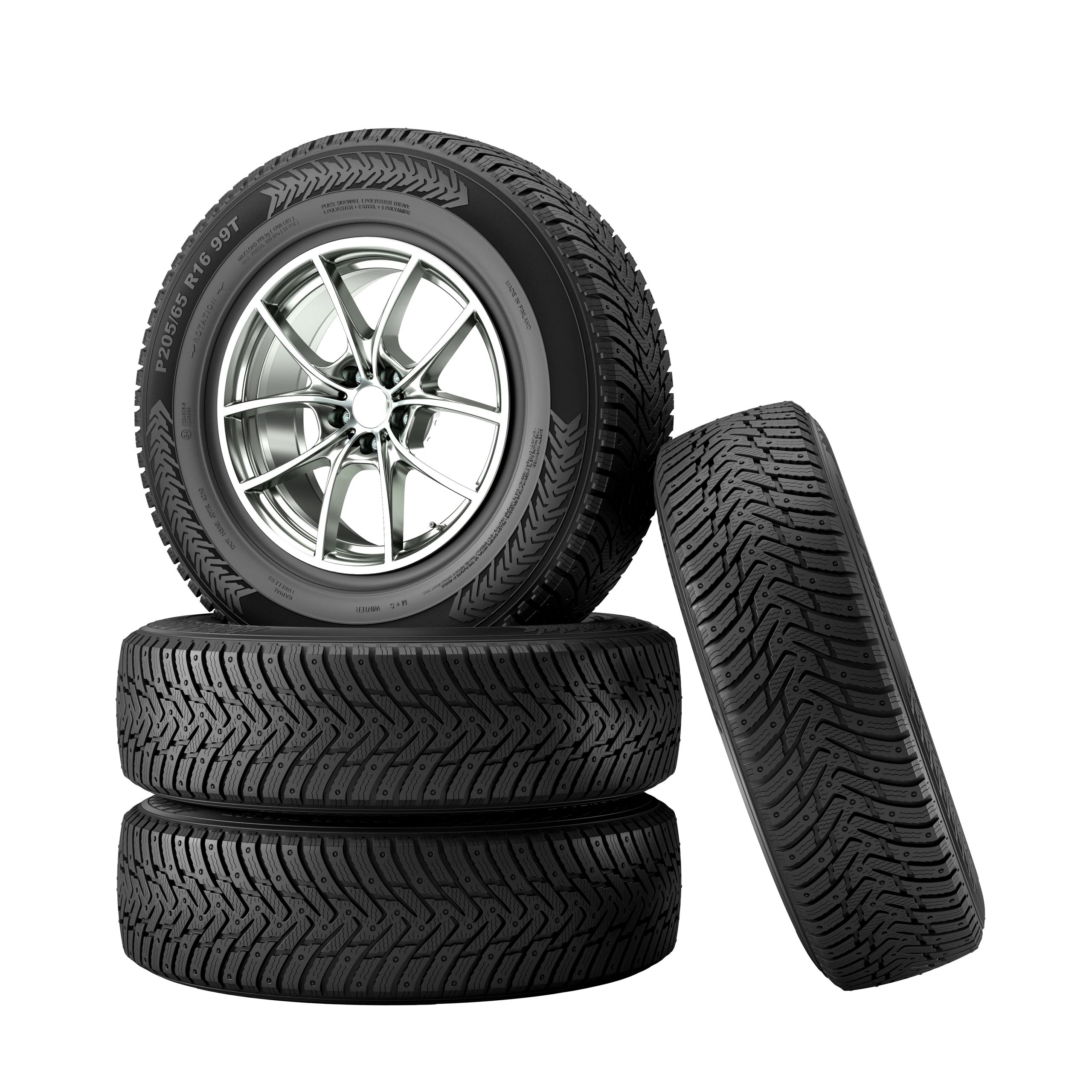 Winter tires stacked on a clean white background
